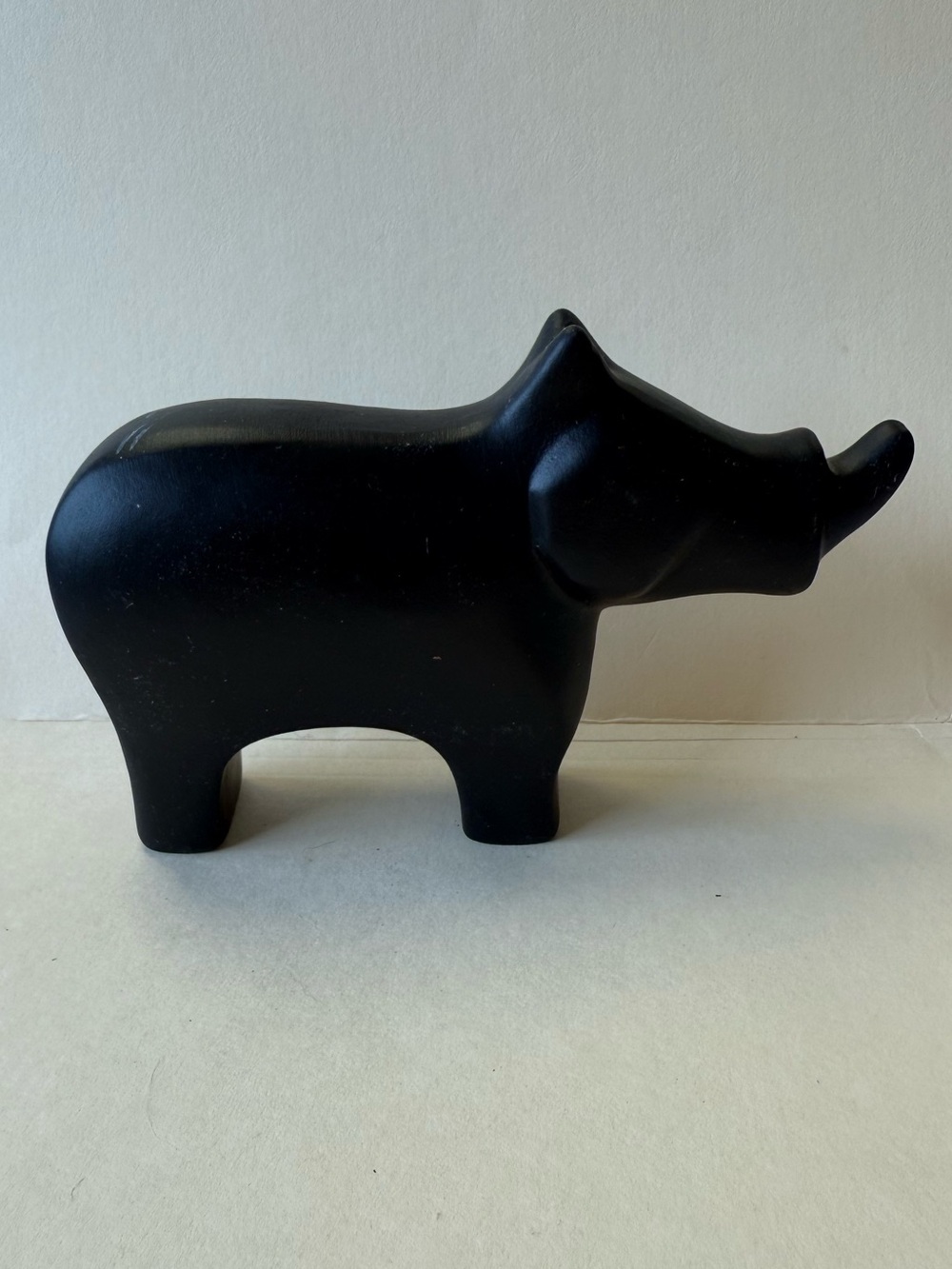 Ceramic Matte Black Simplistic Rhinoceros Decorative Figurine.